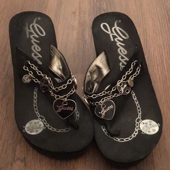 guess flip flops with charms
